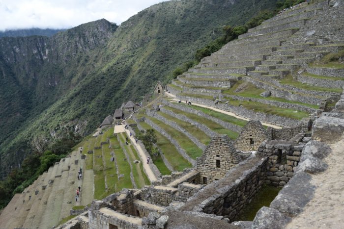 Hire a guide to show you around Machu Picchu, Peru