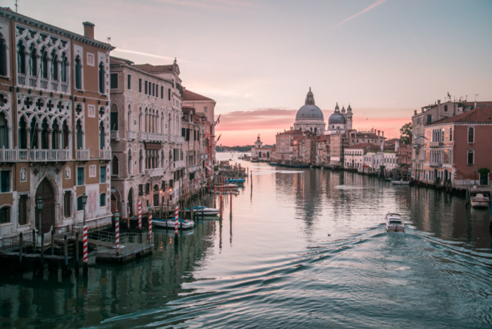 The best place to watch the sunrise in Venice, Italy is Accademia Bridge.