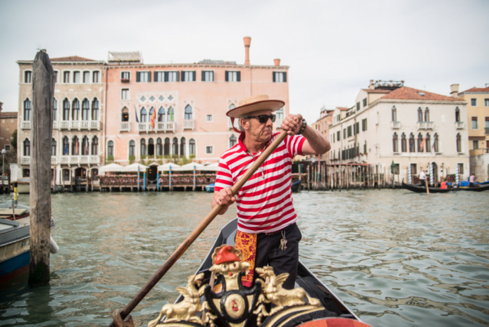 Hire a gondolier to take you on a gondola ride in Venice, Italy