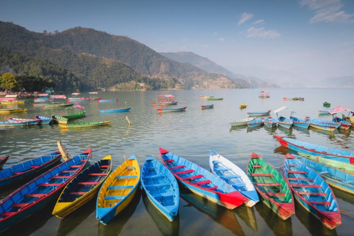 Visiting Nepal colorful boats 