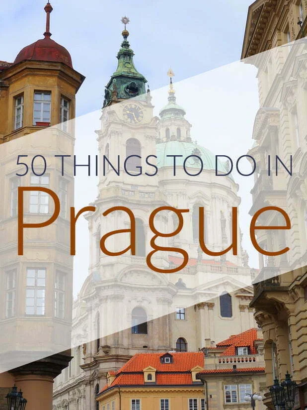 Cover graphic for a travel guide titled “50 Things to Do in Prague, Czech Republic” featuring the baroque towers and pastel historic buildings of Old Town under a cloudy sky