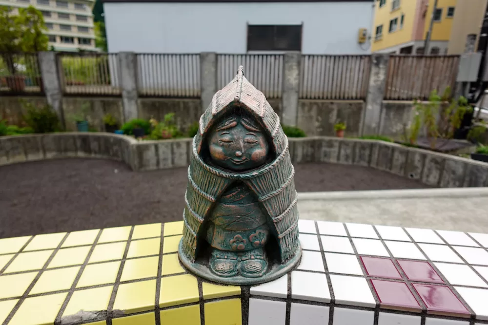 Statue at one of the many free outdoor foot baths in Yuzawa