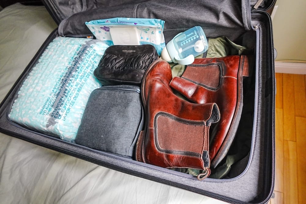 What one side of the Level8 Voyageur suitcase looked like once packed for family travel with a toddler.