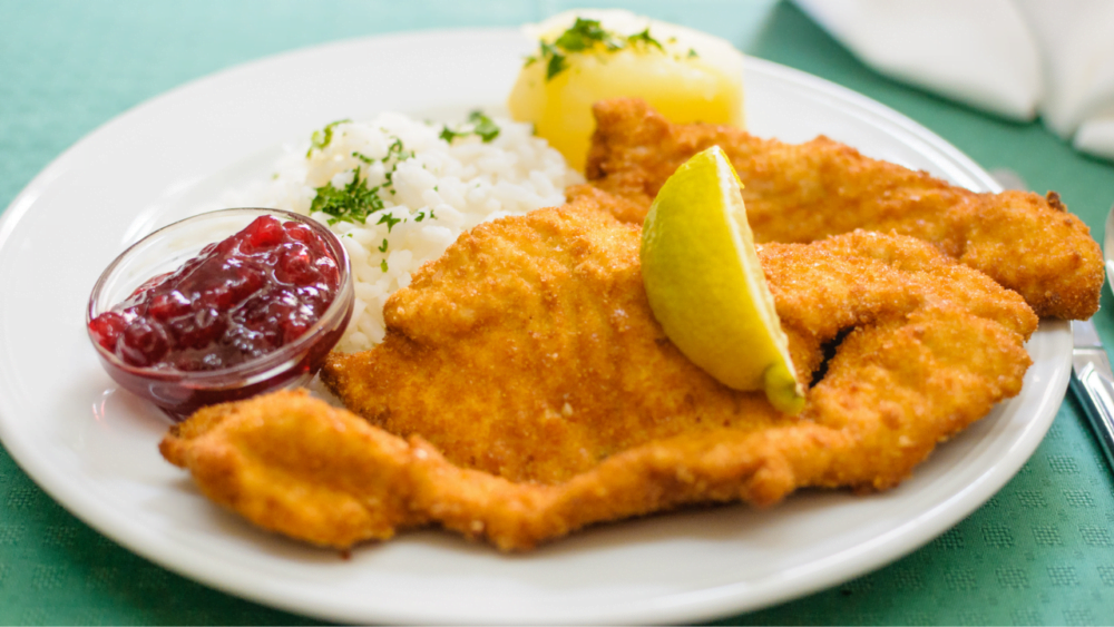 Eating schnitzel on a Vienna food tour