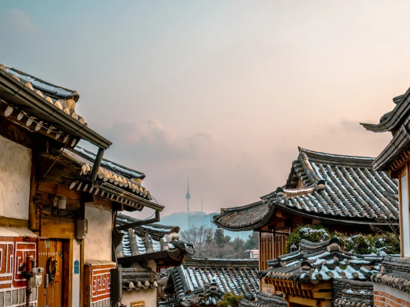 Visiting Seoul in winter and seeing the hanok buildings covered in snow 