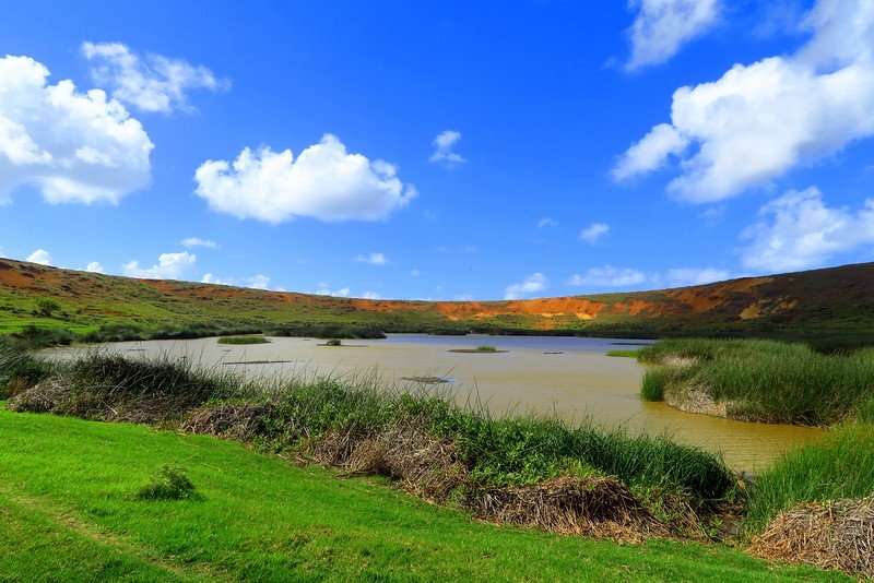 A freshwater lake and wetlands inside Rano Raraku Volcano viewpoint offering natural scenery on Easter Island / Rapa Nui in Chile 
