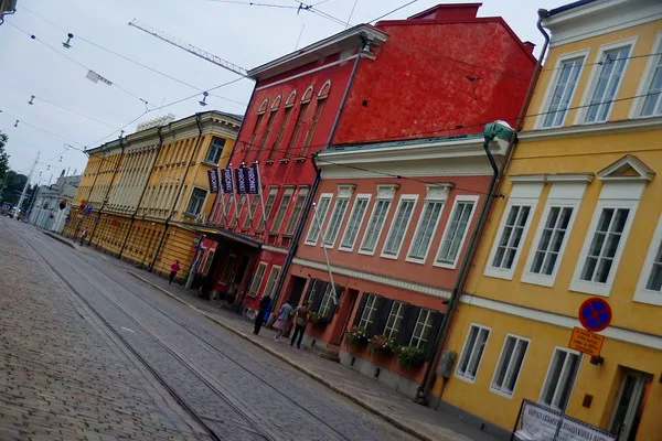 A quiet but colourful street in Helsinki, Finland with no traffic or pedestrians
