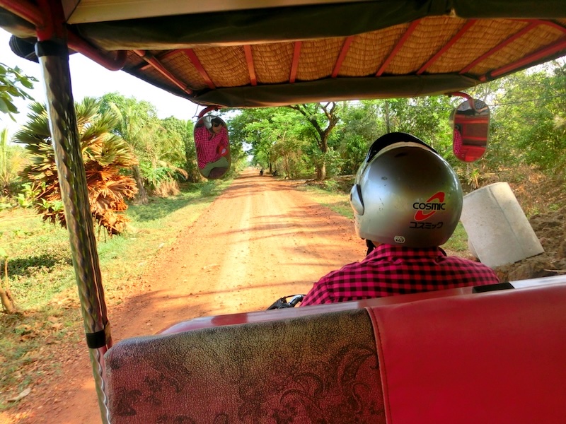 A rural tuk-tuk autorickshaw tour of the countryside in Battambang is a good alternative to the bamboo train in Cambodia 