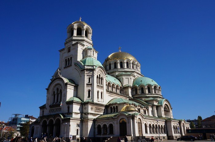 Alexander Nevsky Cathedral in Sofia, Bulgaria, showcasing its golden domes, green copper roofs, and Neo-Byzantine architecture, one of the largest Orthodox cathedrals in the world and a defining landmark of the Bulgarian capital