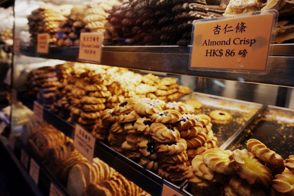 Almond cookies and other assorted sweets for sale and on display at a local bakery in Hong Kong