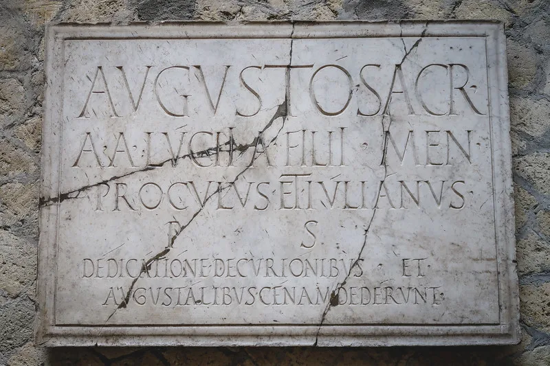 Ancient roman signs in the ruins of Herculaneum that is cracked Ancient roman signs in the ruins of Herculaneum that is cracked