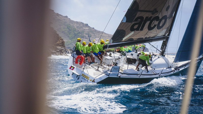Antigua Sailing Week with waves crashing in Chase the Race Antigua Sailing Week with waves crashing in Chase the Race