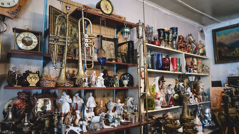 Antique Shop of Aleksandr Korablev with many Soviet era artifacts, souvenirs, trinkets and antiques on display and impressive in Karakol, Kyrgyzstan