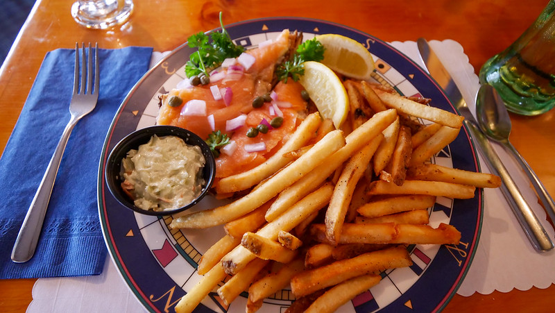 Atlantic smoked salmon on rye with a side of french fries at The Cove Restaurant located on southern Cape Breton, Nova Scotia 