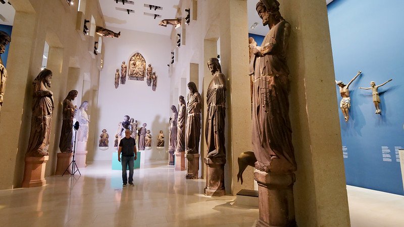 Exploring the grand sculpture hall of the Augustiner Museum in Freiburg im Breisgau, Germany, showcasing towering medieval statues originally from Freiburg Cathedral — a highlight stop even with just 48 hours in the city