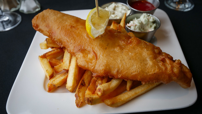 Beer-battered hand-cut haddock, served with fries and tartar sauce at MacRae's in Dundee Resort located on Cape Breton, Nova Scotia