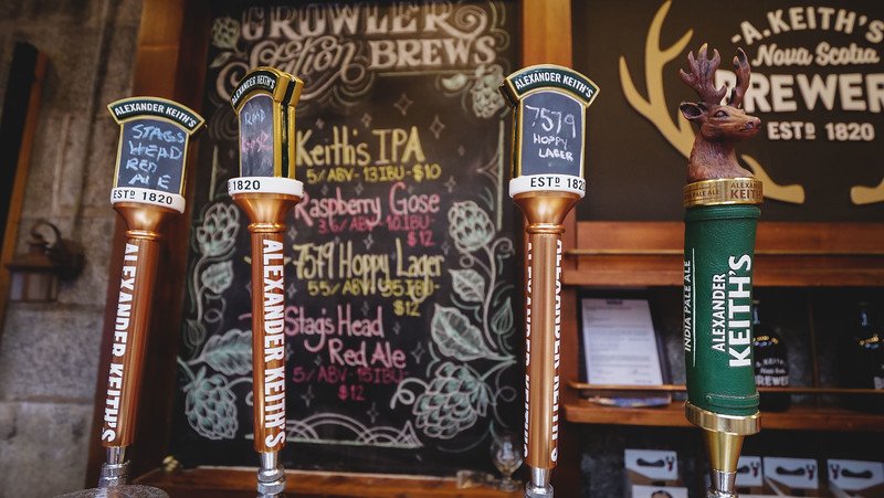Beers on tap at Alexander Keith's Brewery in Halifax, Nova Scotia including Keith's IPA, Raspberry Gose and Happy Lager