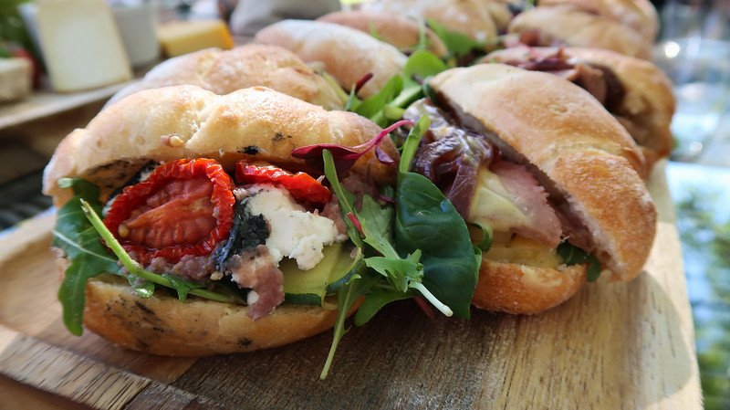 Brunch at the vineyard with sandwiches filled with tasty ingredients in Stellenbosch, South Africa 