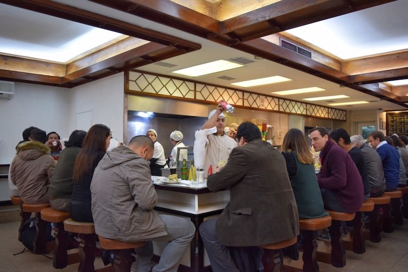 Busy restaurant in Santiago, Chile that is packed with locals not tourists
