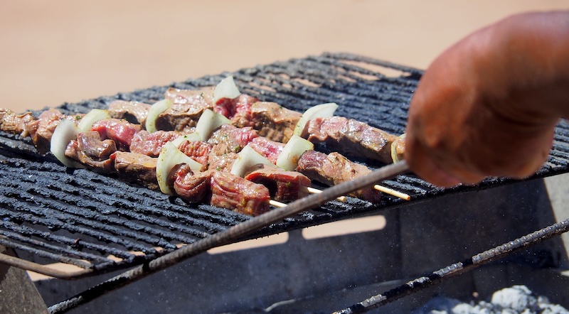 Chilean asado bbq cooked on the grill in San Pedro de Atacama, Chile 