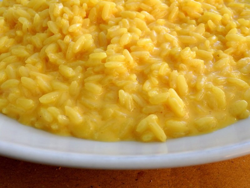 Classic Milan risotto with saffron as a main ingredient is the ultimate comfort food in Lombardy, Italy Classic Milan risotto with saffron as a main ingredient is the ultimate comfort food in Lombardy, Italy