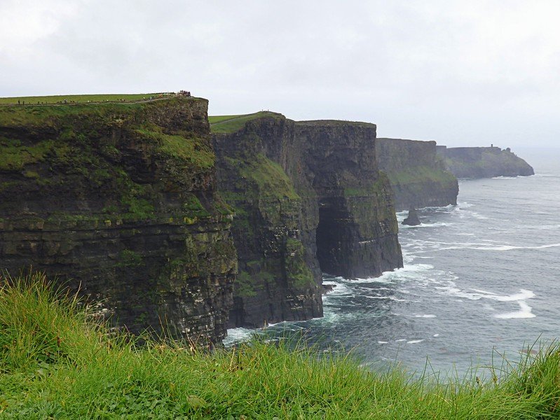 Cliffs of Moher while on our Ireland road trip with the most impressive rugged coastal views on the entire journey together