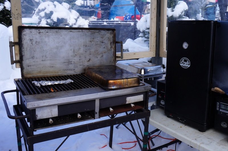 Cooking fish on the grill wrapped in aluminum paper Quebec City in winter Cooking fish on the grill wrapped in aluminum paper Quebec City in winter