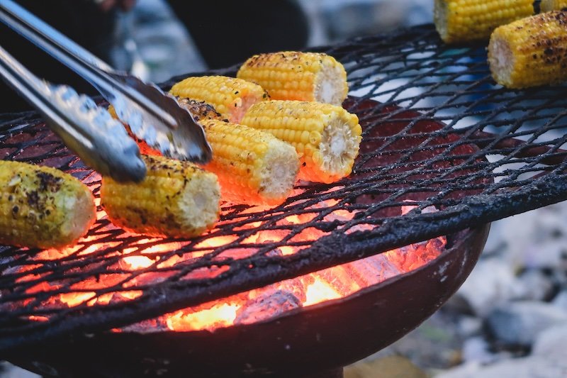 Corn on the grill being cooked in Antigua for dinner Corn on the grill being cooked in Antigua for dinner