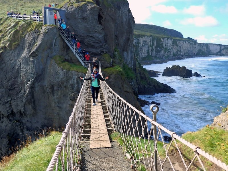 Crossing the rope bridge even though it was scary on the Ireland Road Trip 