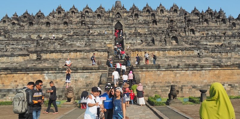 Crowds visiting Borobudur, Indonesia are intense at times but nothing like Angkor Wat 