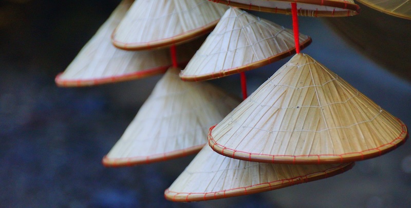 Dangling conical hats for sale in Vietnam Dangling conical hats for sale in Vietnam