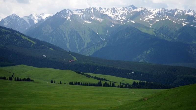 Day trip out into nature from Karakol, Kyrgyzstan with giant mountains 