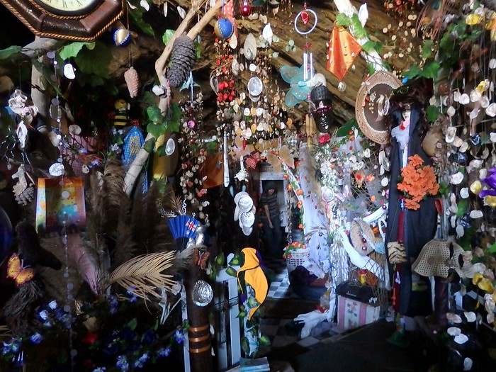 Decorations including various ornaments and trinkets and other fascinating objects inside of Kaaiman's Grotto in Wilderness