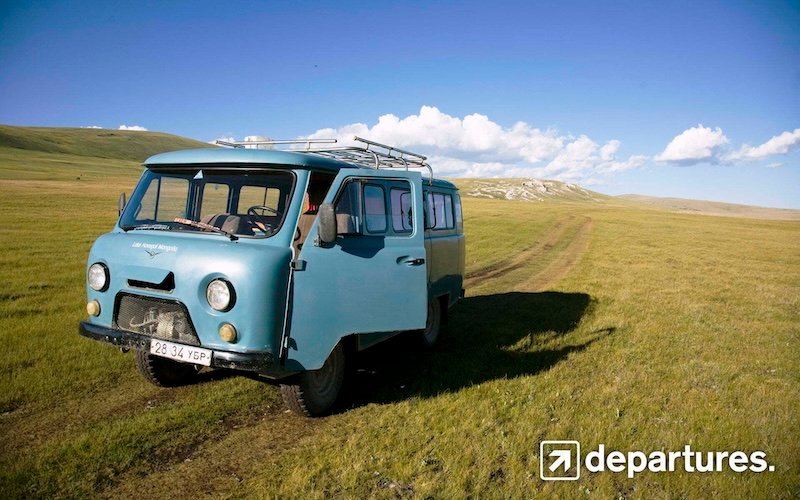 Departures driving a van in Mongolia for the ultimate outdoor travel adventure visiting remote places around the world 