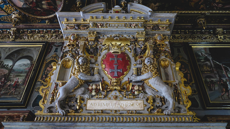 Details inside the Historical Museum in Gdansk with lions guarding and lots of gold details in Poland