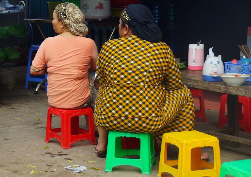 Dining on plastic chairs to eat meals in Vietnam is the standard choice 