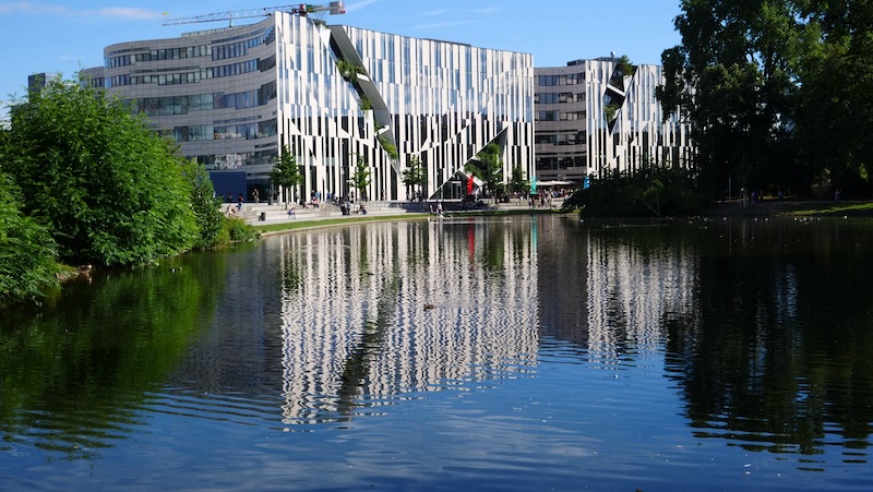 Distinct architecture and museums reflected in the pond in Dusseldorf, Germany 