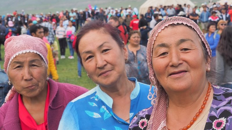 Distinct faces at the World Nomad Games with three ladies with laods of personality in Kyrgyzstan 