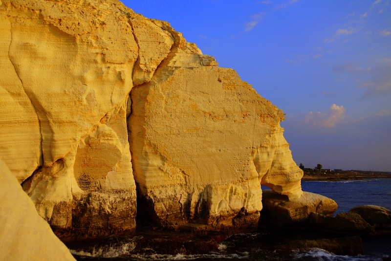 Distinct golden sunlit land formations at Rosh Hanikra as a day trip from Nazareth, Israel Distinct golden sunlit land formations at Rosh Hanikra as a day trip from Nazareth, Israel