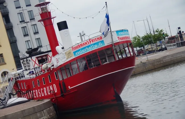 Distinct red fishing boat in Helsinki, Finland 