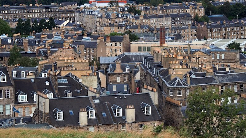 Distinct rooftop views of Edinburgh from a high vantage point in Scotland Distinct rooftop views of Edinburgh from a high vantage point in Scotland