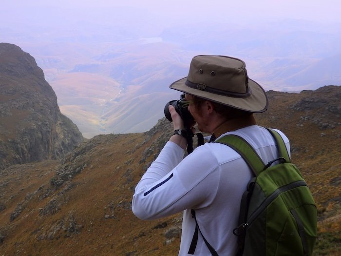 Drakensberg incredible mountain views on a hike with photographer Nomadic Samuel snapping photos 