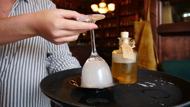 Drinks at The Drugstore Social in Glasgow, Scotland served and presented upside down to our table Drinks at The Drugstore Social in Glasgow, Scotland served and presented upside down to our table