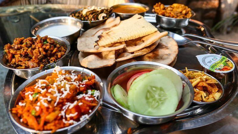 Eating a Rajasthani Thali set in Jodhpur with an epic spread and feast of feasts on offer in India