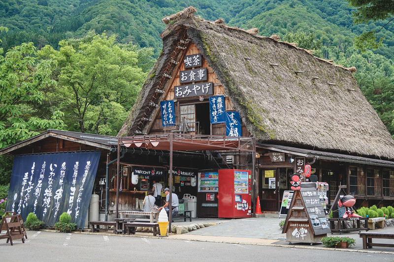 Eating at a local restaurant set in an old farmhouse in Shirakawa-go, Japan for traditional Japanese cuisine Eating at a local restaurant set in an old farmhouse in Shirakawa-go, Japan for traditional Japanese cuisine