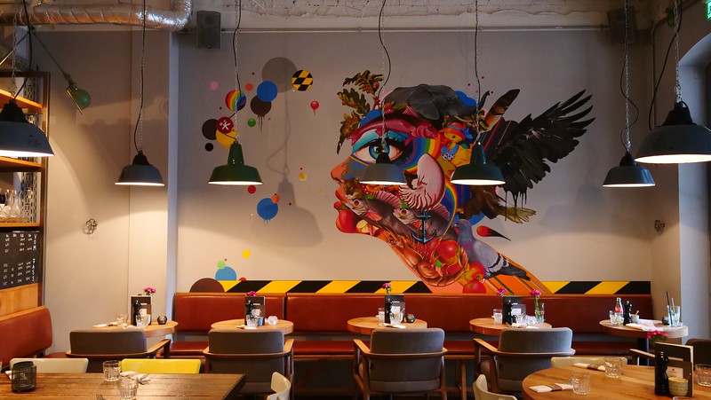 Eating at Hausmann's in Düsseldorf with its funky and unique vibe that is inviting for hungry diners in Germany