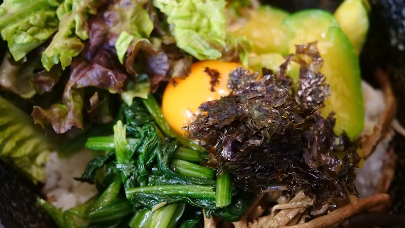 Eating dolsot bibimbap in Osaka, Japan macro details visiting Koreatown neighborhood 