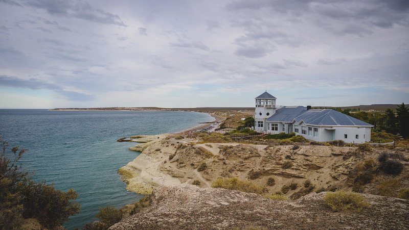 The EcoCentro in Puerto Madryn, Patagonia, Argentina, perched dramatically on coastal cliffs overlooking the Atlantic Ocean, is a cultural and educational space dedicated to marine conservation, offering sweeping views and interactive exhibits