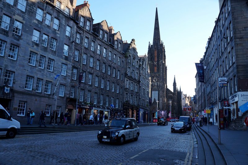 Edinburgh Royal Mile filled with taxis is a common street level scene 