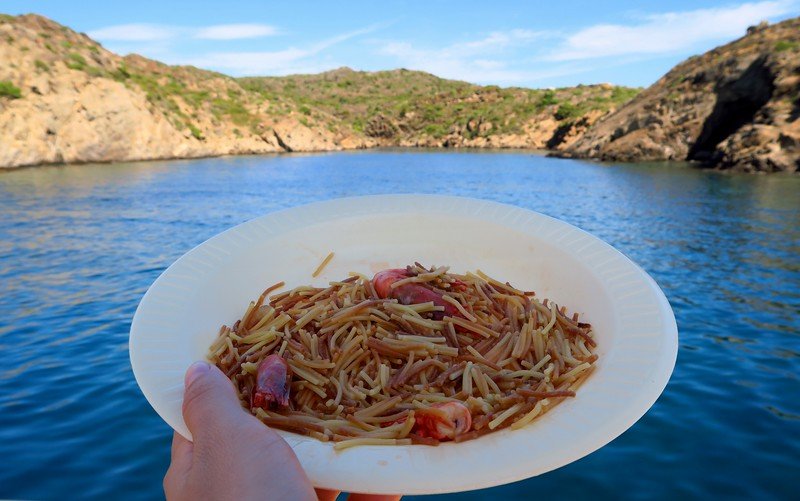 Enjoying a seafood meal aboard the Sant Isidre in Costa Brava with an incredible viewpoint from the boat